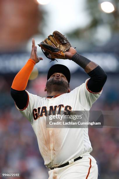 Third baseman Pablo Sandoval of the San Francisco Giants catches a ball hit by Matt Carpenter in the fourth inning at AT&T Park on July 5, 2018 in...