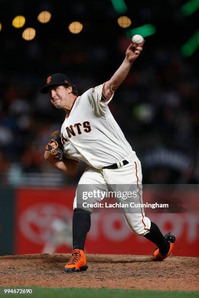 Derek Holland of the San Francisco Giants pitches in the eighth inning against the St Louis Cardinals at AT&T Park on July 5, 2018 in San Francisco,...