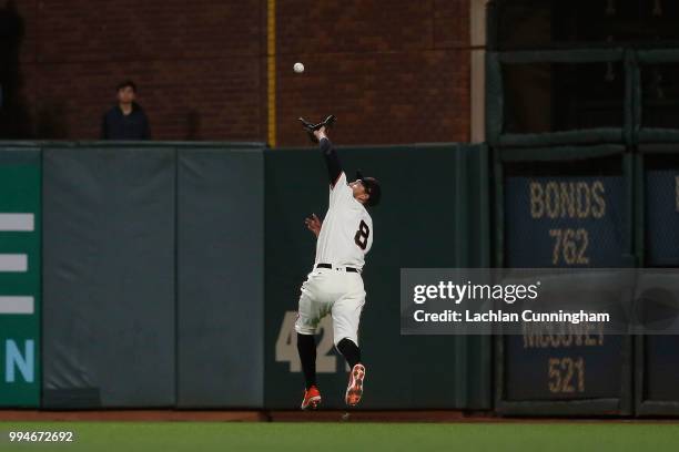 Hunter Pence of the San Francisco Giants catches a ball hit by Yadier Molina of the St Louis Cardinals in the eighth inning at AT&T Park on July 5,...