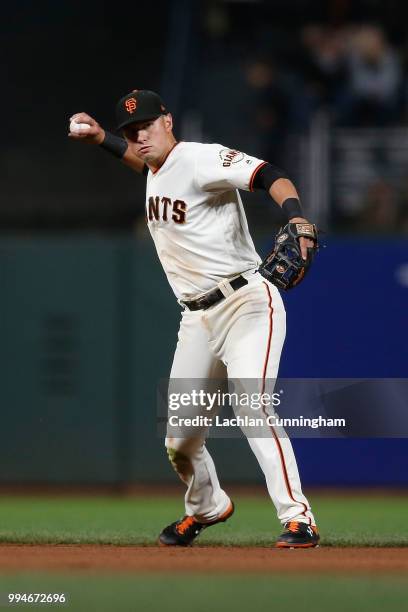 Joe Panik of the San Francisco Giants fields the ball in the ninth inning against the St Louis Cardinals at AT&T Park on July 5, 2018 in San...