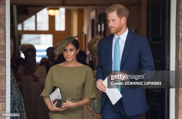 Britain's Prince Harry, Duke of Sussex and Meghan, Duchess of Sussex leave after the christening of Britain's Prince Louis of Cambridge at the Chapel...