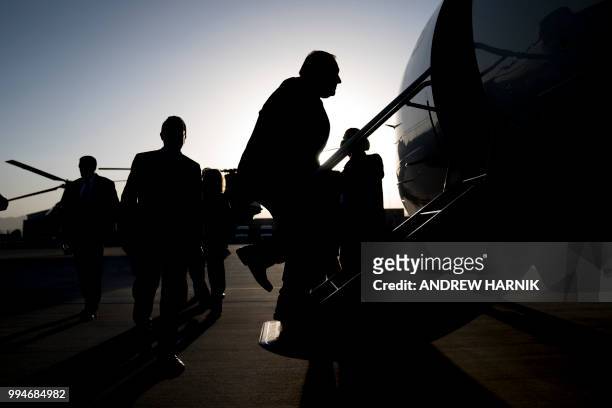 Secretary of State Mike Pompeo boards a plane at Camp Alvarado in Kabul, Afghanistan, Monday, July 9 for a short flight to Bagram Air Base after...