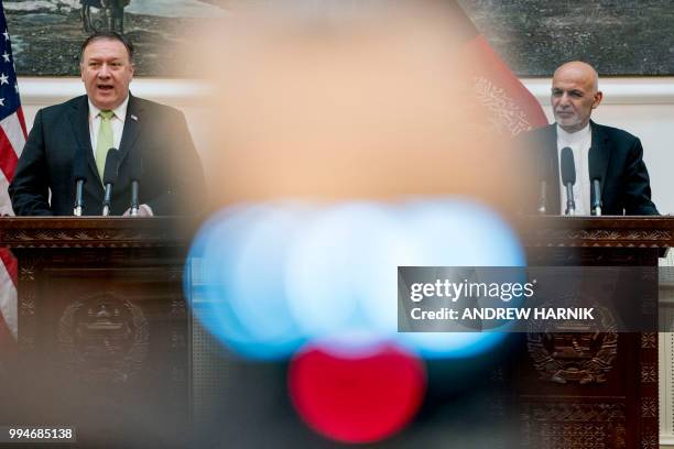 Secretary of State Mike Pompeo and Afghan President Ashraf Ghani conduct a news conference at the Presidential Palace in Kabul, Afghanistan, Monday,...