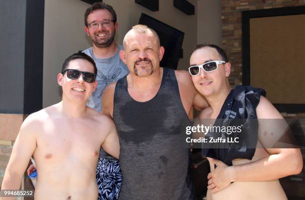 Hall of famer Chuck Liddell poses for a photo with fans during a UFC Pool Party on July 8, 2018 at the Hard Rock Hotel & Casino in Las Vegas, Nevada.