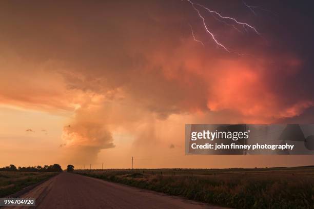 lightning with a mesocyclone, nebraska. usa - forked lightning stock pictures, royalty-free photos & images