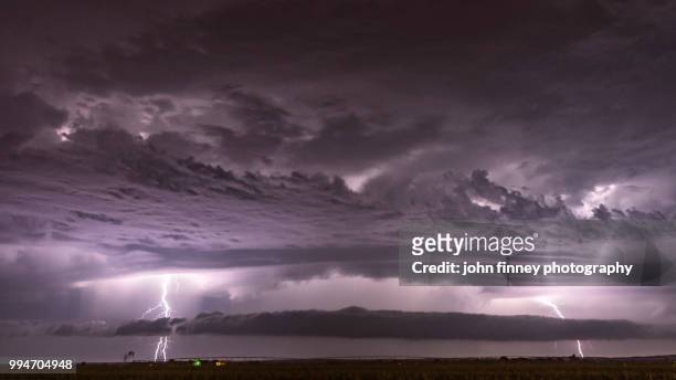 strong double lightning over nebraska. usa - forked lightning stock pictures, royalty-free photos & images
