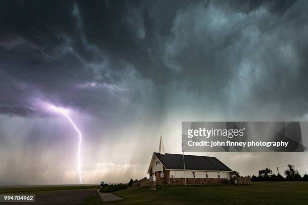 lightning and chapel of the plains, colorado. usa - forked lightning stock pictures, royalty-free photos & images