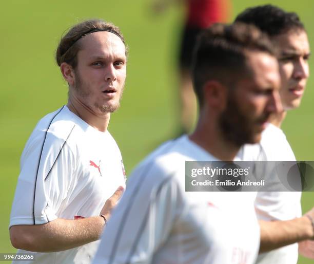 Alen Halilovic of AC Milan looks on during the AC Milan training session at the club's training ground Milanello on July 9, 2018 in Solbiate Arno,...