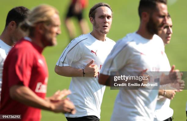 Alen Halilovic of AC Milan looks on during the AC Milan training session at the club's training ground Milanello on July 9, 2018 in Solbiate Arno,...