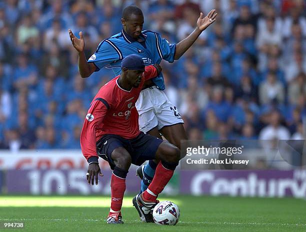 Efe Sodje of Crewe holds off Paulo Wanchope of Man City during the Nationwide First Division match between Manchester City and Crewe Alexandra at...
