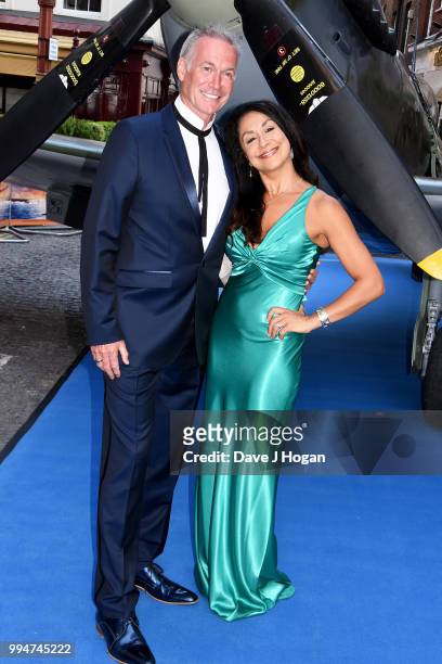 Dr Hilary Jones and guest attend the World Premiere of "Spitfire" at The Curzon Mayfair on July 9, 2018 in London, England.