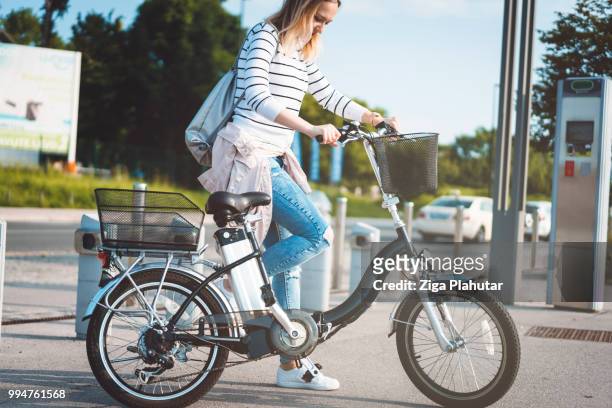 summer-time activity in the city - three wheeled vehicle stock pictures, royalty-free photos & images