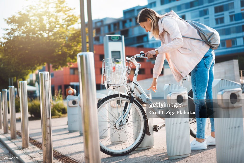 Young girl parking her bike
