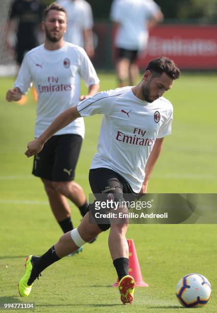 Hakan Calhanoglu of AC Milan in action during the AC Milan training session at the club's training ground Milanello on July 9, 2018 in Solbiate Arno,...
