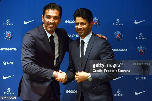 President of PSG Nasser Al-Khelaifi and Gianluiggi Buffon of Paris Saint-Germain pose after the press conference during the Italian official...