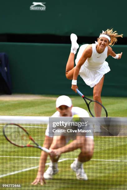 Jamie Murray of Great Britain and Victoria Azarenka of Belarus during their Mixed Doubles second round match against Robert Farah of Colombia and...