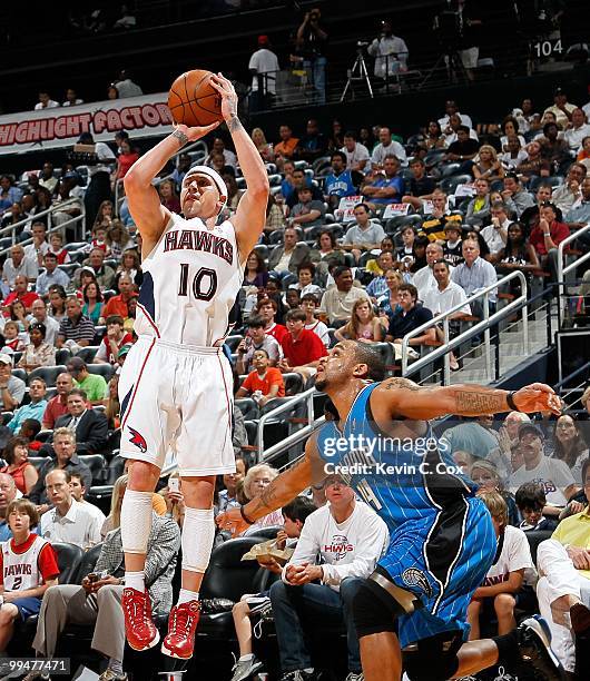 Jameer Nelson of the Orlando Magic and Mike Bibby of the Atlanta Hawks during Game Three of the Eastern Conference Semifinals during the 2010 NBA...