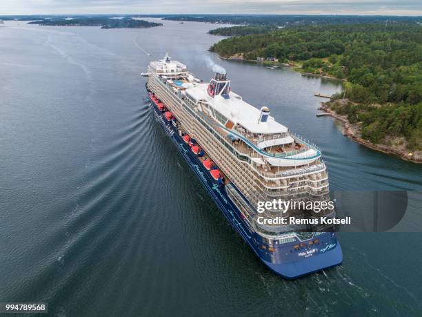 mein schiff 1 cruiser ship passing by in the stockholm swedish archipelago - schiff stock pictures, royalty-free photos & images