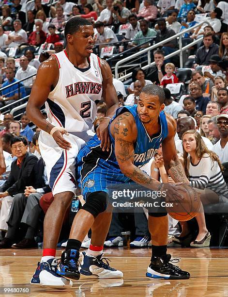 Jameer Nelson of the Orlando Magic and Joe Johnson of the Atlanta Hawks during Game Three of the Eastern Conference Semifinals during the 2010 NBA...