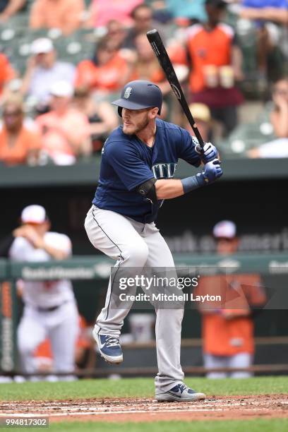 Chris Herrmann of the Seattle Mariners prepares for a pitch during a baseball game against the Baltimore Orioles at Oriole Park at Camden Yards on...