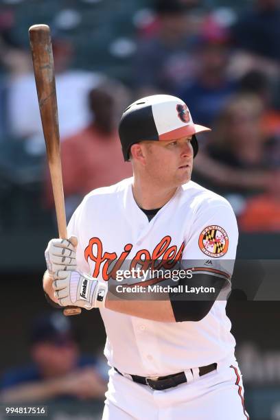 Mark Trumbo of the Baltimore Orioles prepares for a pitch during a baseball game against the Seattle Mariners at Oriole Park at Camden Yards on June...