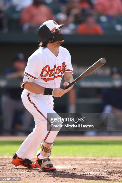 Colby Rasmus of the Baltimore Orioles takes a swing during a baseball game against the Seattle Mariners at Oriole Park at Camden Yards on June 28,...