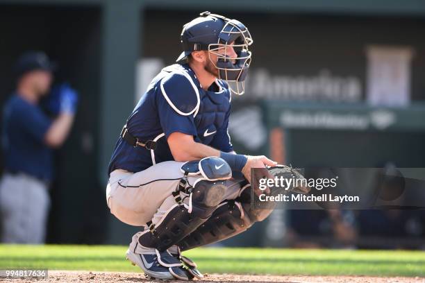 Chris Herrmann of the Seattle Mariners in position during a baseball game against the Baltimore Orioles at Oriole Park at Camden Yards on June 28,...