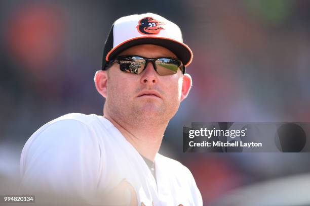 Mark Trumbo of the Baltimore Orioles looks on during a baseball game against the Seattle Mariners at Oriole Park at Camden Yards on June 28, 2018 in...