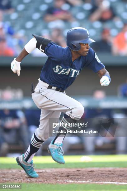 Dee Gordon of the Seattle Mariners runs to first base during a baseball game against the Baltimore Orioles at Oriole Park at Camden Yards on June 28,...