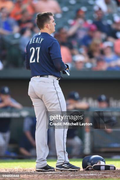 Ryon Healy of the Seattle Mariners looks on after striking out during a baseball game against the Baltimore Orioles at Oriole Park at Camden Yards on...