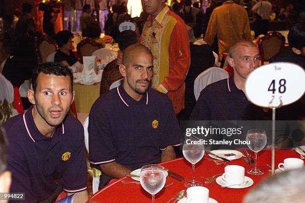 Ryan Giggs and Juan Sebastian Veron of Manchester United and at a Gala Dinner held in a Hotel in Kuala Lumpur during Manchester United's Far East...