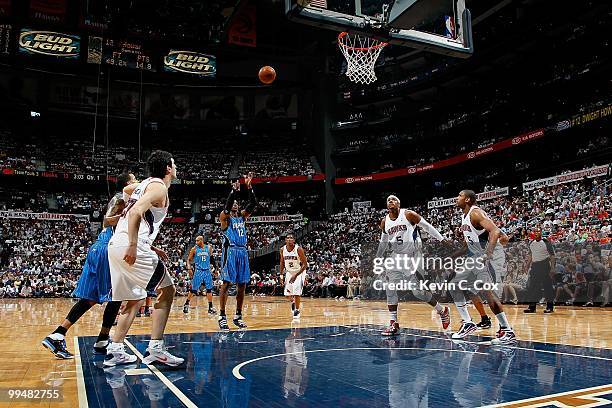 Dwight Howard of the Orlando Magic shoots a free throw against the Atlanta Hawks during Game Three of the Eastern Conference Semifinals during the...