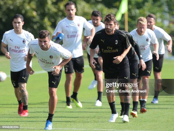Patrick Cutrone of AC Milan trains with his teammates during the AC Milan training session at the club's training ground Milanello on July 9, 2018 in...