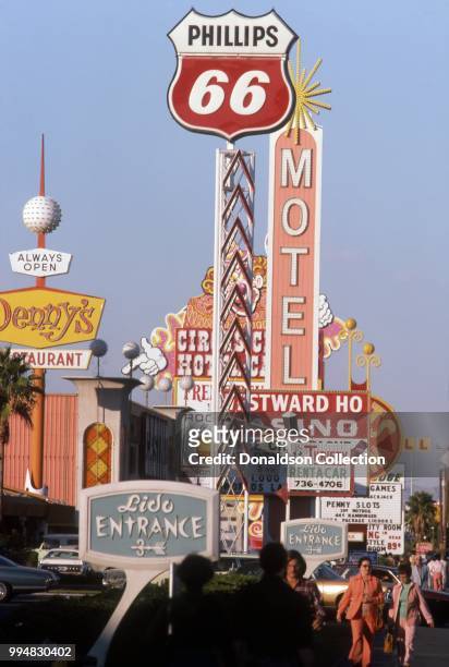 View of the sign outside Circus Circus, Denny's Restaurant and a Phillips 66 gas station in October 1977 in Las vegas, Nevada.