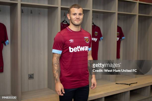Jack Wilshere poses after signing for West Ham United on July 09, 2018 in London, England.