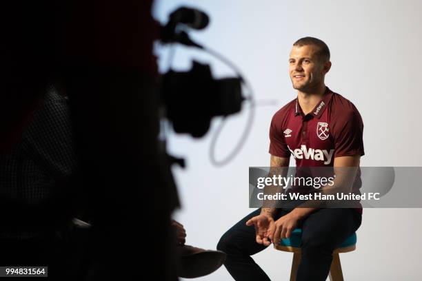 Jack Wilshere poses after signing for West Ham United on July 09, 2018 in London, England.