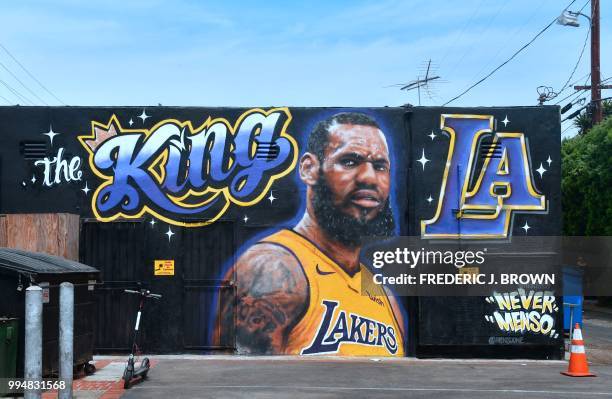 Mural of LeBron James in a Los Angeles Lakers jersey is viewed in Venice, California on July 9, 2018. - It was originally revealed July 6 and then...
