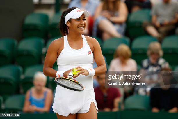 Heather Watson of Great Britain smiles during their Mixed Doubles second round match against Marcin Matkowski of Poland and Mihaela Buzarnescu of...