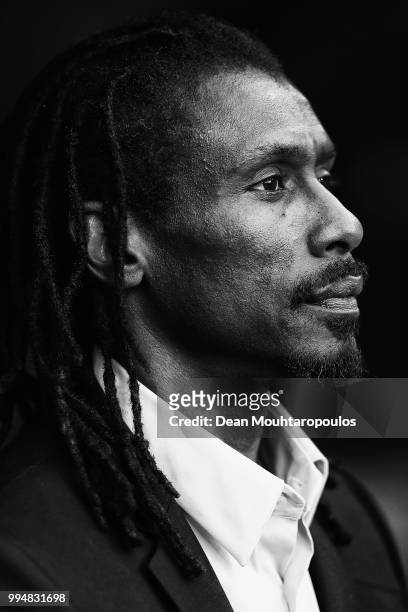 Manager / Head Coach of Senegal, Aliou Cisse puts his hand to his heart after the national anthem prior to the 2018 FIFA World Cup Russia group H...
