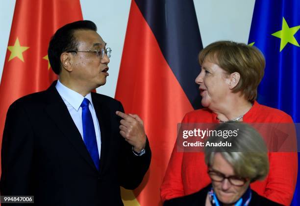 German Chancellor Angela Merkel and Chinese Prime Minister Li Keqiang attend a signing ceremony within the 5th German-Chinese intergovernmental...