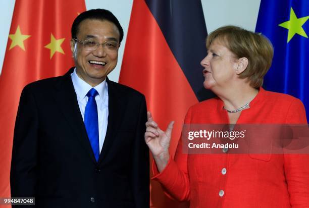 German Chancellor Angela Merkel and Chinese Prime Minister Li Keqiang attend a signing ceremony within the 5th German-Chinese intergovernmental...