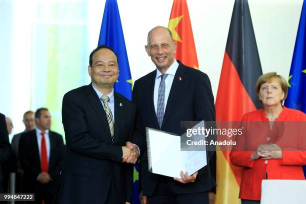 Thuringian Minister of Economy, Science Wolfgang Tiefensee and Chairman of Contemporary Amperex Technology Co Ltd Zeng Yuqun sign an agreement as...