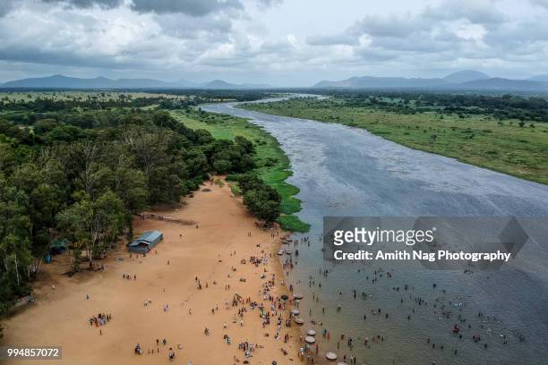 an aerial view of kaveri river flowing through talakadu - 網代船 ストックフォトと画像