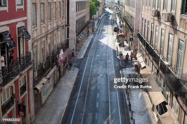 view into a street in lissabon - lissabon stock pictures, royalty-free photos & images