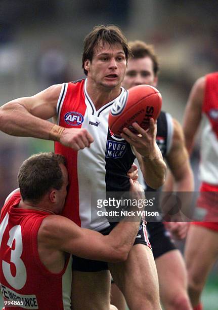 Aaron Hamill of St Kilda gets his handball away during the round 21 match between the Sydney Swans and the St Kilda played at the Sydney Cricket...