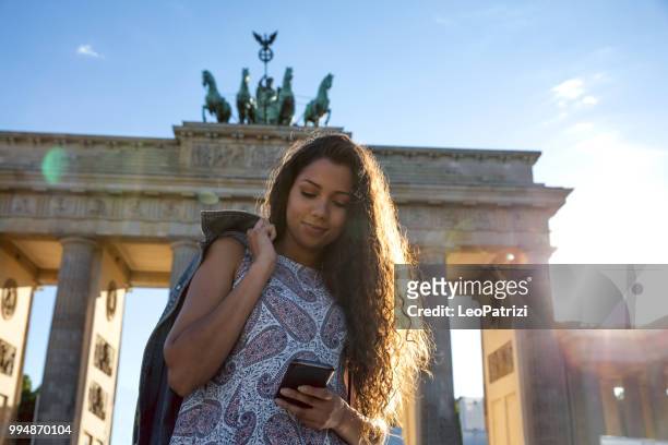 young woman on travel in berlin - germany during summer holidays - leopatrizi stock pictures, royalty-free photos & images