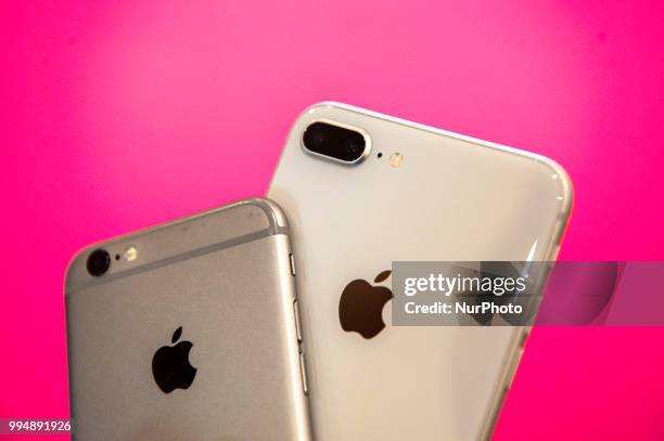 An iPhone 6s and an iPhone 8 plus are seen in this photo illustration on July 9, 2018.