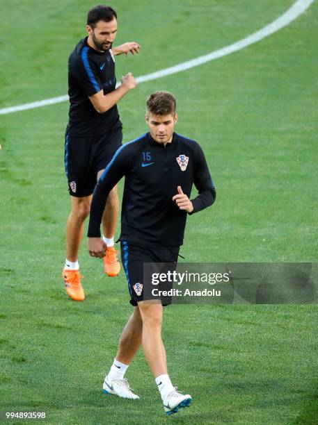 Duje Caleta-Car of Croatia attends a training session ahead of the 2018 FIFA World Cup Russia semi final match between Croatia and England at the...