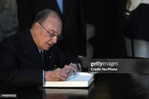 Prince Karim Aga Khan IV signs the honor book during an official visit at the Belem Palace in Lisbon, Portugal, on July 9, 2018. Prince Karim Aga...