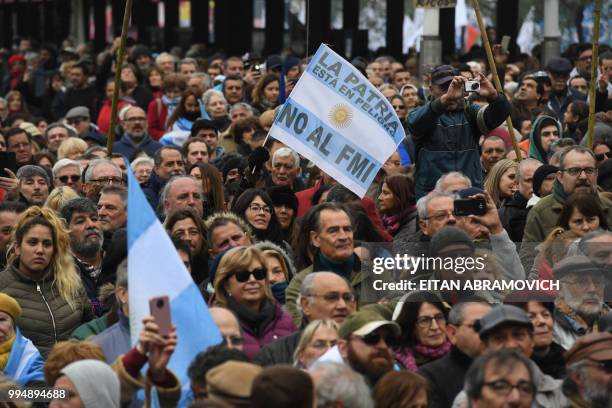 People demonstrate against the government of President Mauricio Macri and the latest deal with the International Monetary Fund, during the 202th...